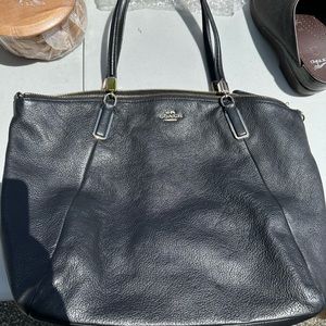 3 black Coach bags, 1 purple coach and 1 silver Michael kohls.